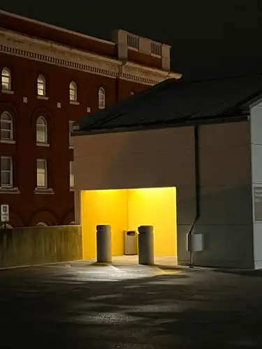 Bright urban mystery in the dead of night.